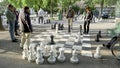 GENEVA, SWITZERLAND - JUNE, 7, 2019: chess players thinking about their next move at a park in geneva