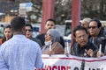 Bangladeshi people protesting at the Broken Chair monumental sculpture in front of the UN office in Geneva, Switzerland