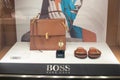 Hugo Boss fashion store, exposition, window shop with modern bags, clothes, shoes from Hugo Boss fashion house Royalty Free Stock Photo