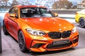 Orange BMW M2 Competition Coupe at Geneva International Motor Show, F22 produced by BMW