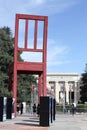 Broken chair and Palace of Nations in Geneva, Switzerland