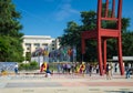 Geneva, Switzerland - September 14, 2016: Broken chair on the square of Nations and walking people