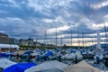 Geneva, Switzerland 8 September 2023: Moored and covered boats at marina at Lake Geneva on a sunny winter day at Swiss City of Royalty Free Stock Photo