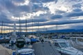 Geneva, Switzerland 8 September 2023: Moored and covered boats at marina at Lake Geneva on a sunny winter day at Swiss City of Royalty Free Stock Photo