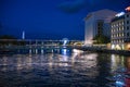 Geneva, Switzerland 8 September 2023: Night riverside view with beautiful reflections of Geneva city, Switzerland Royalty Free Stock Photo