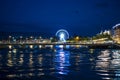 Geneva, Switzerland 8 September 2023: Night riverside view with beautiful reflections of Geneva city, Switzerland Royalty Free Stock Photo