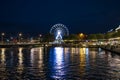 Geneva, Switzerland 8 September 2023: Night riverside view with beautiful reflections of Geneva city, Switzerland Royalty Free Stock Photo