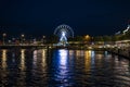 Geneva, Switzerland 8 September 2023: Night riverside view with beautiful reflections of Geneva city, Switzerland Royalty Free Stock Photo