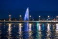 Geneva, Switzerland 8 September 2023: Night riverside view with beautiful reflections of Geneva city, Switzerland Royalty Free Stock Photo