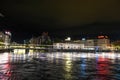 Geneva, Switzerland 8 September 2023: Night riverside view with beautiful reflections of Geneva city, Switzerland Royalty Free Stock Photo