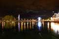 Night riverside view with beautiful reflections of Geneva city, Switzerland Royalty Free Stock Photo