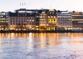 Geneve. Switzerland - December 30, 2021: View of the evening embankment of Geneva on Lake leman