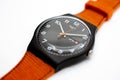 Geneve, Switzerland 07.10.2020 - Swatch watch Orange strap and seconds arrow