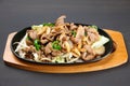 Genghis Khan lamb barbecue plate Royalty Free Stock Photo