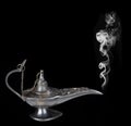 Genie lamp with a smoke Royalty Free Stock Photo