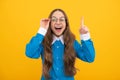 Genius idea. Girl genius with raised finger. Child prodigy in eyeglasses. Wunderkind. School education Royalty Free Stock Photo