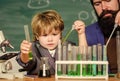 Genius kid. Joys and challenges raising gifted child. Teacher child test tubes. Chemical experiment. Genius minds. Signs