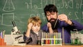 Genius kid. Teacher child test tubes. Chemical experiment. Achieving developmental milestones way before predicted sign Royalty Free Stock Photo