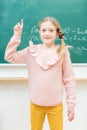 Genius schoolgirl could solve the math task Royalty Free Stock Photo