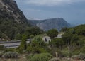 Genna Silana pass, Urzulei, Sardinia, Italy, September 19, Two bikers drive on asphalt road at Genna Silana pass at Supramonte