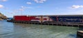 GENOA, ITALY, APRIL 09, 2021 - View of Genova Nervi pier painted with Genoa team football club colours, Genoa, Italy