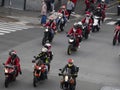 GENOA, ITALY - DECEMBER 23 2023 - The parade of Santas on motorcycles