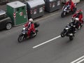 GENOA, ITALY - DECEMBER 23 2023 - The parade of Santas on motorcycles