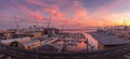 Genoa, Italy - 06 26 2021: Genoa port and Yacht Club at sunset.