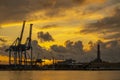 View of Lanterna lighthouse in the port of the city of Genoa at sunset with cloudy sky, Italy Royalty Free Stock Photo