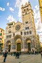 GENOA, ITALY, MARCH 13, 2016: people are walking in front of the cathedral of saint lorenzo in the italian city genoa