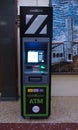 Genoa, Italy - May 27, 2023: A Cashzone ATM hole in the wall cash machine