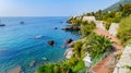 Genoa, Italy. In Nervi, some people canoeing among the rocks, in the sea of the Nervi coast, near Genoa. Royalty Free Stock Photo