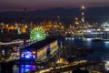 Aerial view of Genoa, Italy at night, the harbor with the Lanterna, the lighthouse, symbol of