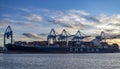 The big container ship Cma Cgm Titus sailing under the flag of France moored in the port of Genoa Royalty Free Stock Photo