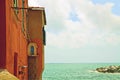 Genoa Italy -red house on the sea Royalty Free Stock Photo