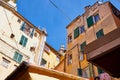 Genoa, Italy - September 24, 2018: Facade of an old building. Fragment of wall of house. Bottom view