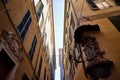 Genoa, Italy - September 24, 2018: Facade of an old building. Fragment of wall of house. Bottom view