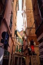 Genoa, Italy - September 24, 2018: Facade of an old building. Fragment of wall of house. Bottom view