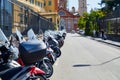 Genoa, Italy - September, 25, 2019: Motorcycles, scooters, bikes, mopeds Parking on street of Genoa city in Italy