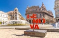 Genoa, Italy, September 11, 2018: Red letters Genova More than this catchphrase on Piazza De Ferrari square Royalty Free Stock Photo