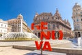 Genoa, Italy, September 11, 2018: Red letters Genova More than this catchphrase on Piazza De Ferrari square Royalty Free Stock Photo