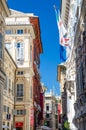 Genoa, Italy, September 11, 2018: Red palace Palazzo Rosso and Palazzo Doria Tursi colorful typical buildings