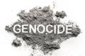 Genocide word written in ash, sand or dust Royalty Free Stock Photo