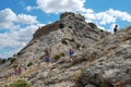 Genoese forsstress. People descend the mountain from the fortre