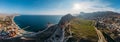 Genoese fortress in Sudak, Crimea. Aerial panorama view of ruins of ancient historic castle on crest of mountain near sea Royalty Free Stock Photo