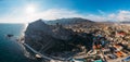 Genoese fortress in Sudak, Crimea. Aerial panorama view of ruins of ancient historic castle on crest of mountain near sea Royalty Free Stock Photo