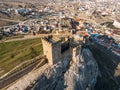 Genoese fortress in Sudak, Crimea. Aerial panorama view of ruins of ancient historic castle or fortress on crest of mountain Royalty Free Stock Photo