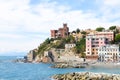 Beautiful view of Vernazzola Beach, colorful houses village in Genoa, Italy