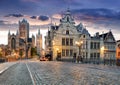 Gent, Belgium with Saint Nicholas Church and Belfort tower at twilight illuminated moment in Flanders