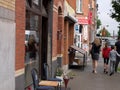 Gent traditional street with family wlaking.